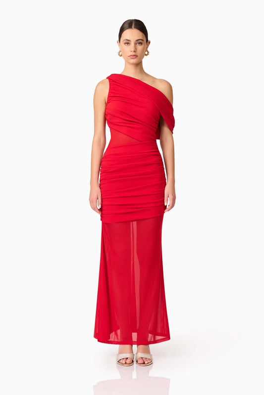Woman wearing a red one-shoulder Elliatt Darya dress on a white background